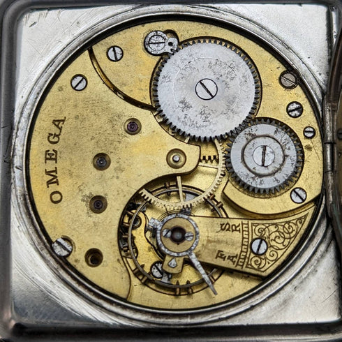 Around 1910 Antique Omega pocket watch with swan engraving square silver side case works well